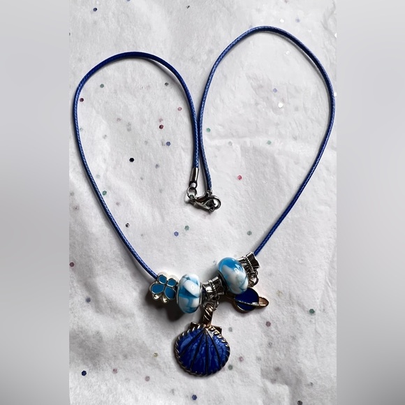 NEW BLUE SEA BUTTERFLIES BLUE CLAMS & SATURN BLUE PLANETS CHARM NECKLACE - Picture 2 of 3